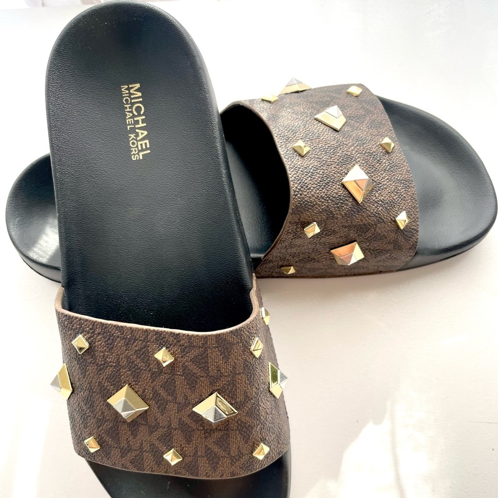 Brand new Michael Kors slides. Size 7